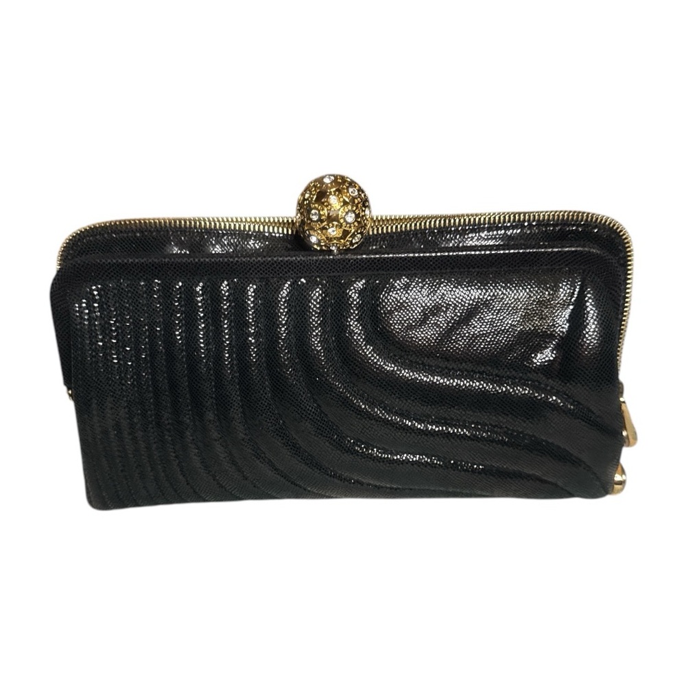Henri Bendel Elegant Black Clutch with Gold Accents